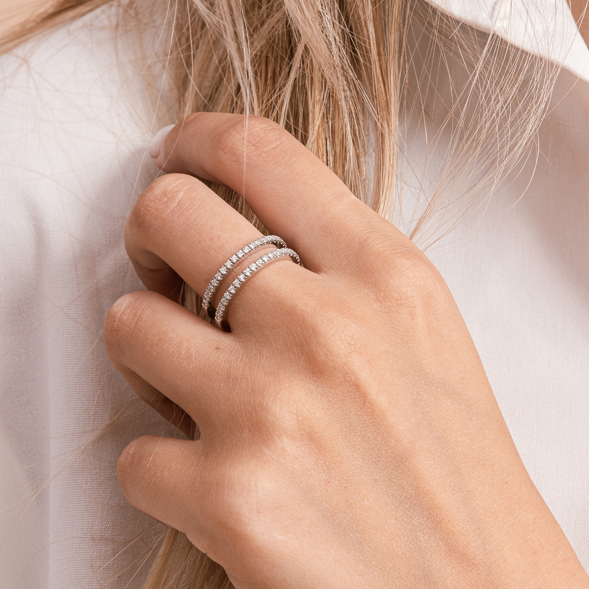 ANELLO BINARIO IN ORO CON BRILLANTI BIANCHI